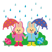 雨の日の登校！傘をさしてレインコートを着たウサギさんのイラスト